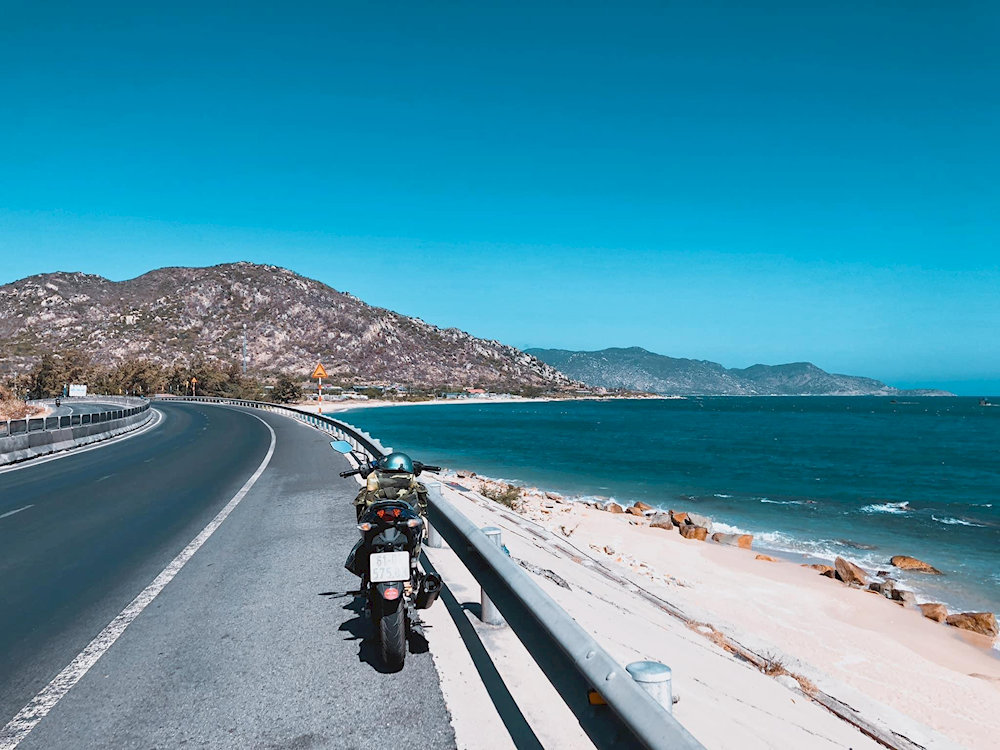The Vinh Hy to Cam Ranh route features pristine beaches and quiet fishing villages along a scenic shoreline 
